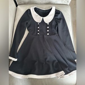 Long sleeves, high waist, black and cream dress